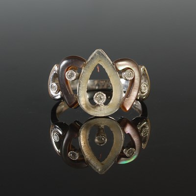 Lot 276 - An 18ct white gold diamond and mother of pearl...