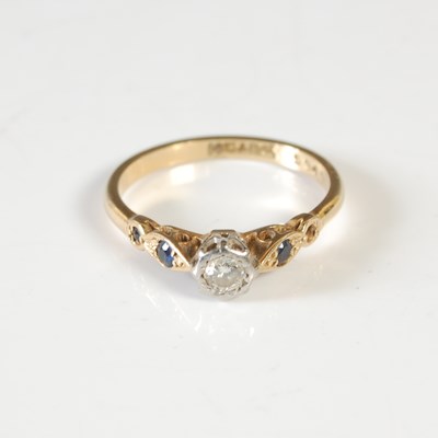 Lot 279 - A white and yellow metal diamond and sapphire...