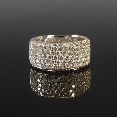 Lot 281 - An 18ct white gold and diamond pave set dress...