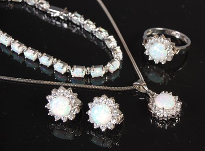 Lot 294 - A group of 14ct white gold and opal set...