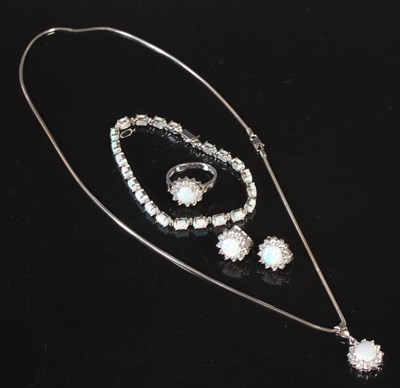 Lot 53 - A group of 14ct white gold and opal set...
