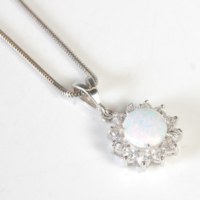 Lot 53 - A group of 14ct white gold and opal set...