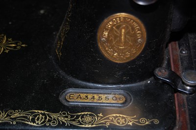 Lot 750 - Two vintage Singer Sewing machines