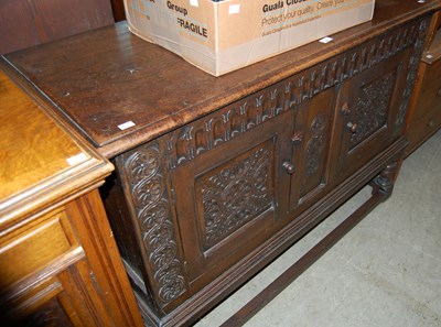 Lot 753 - A late 19th / early 20th century stained oak...