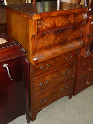 Lot 725 - A flame mahogany chest of drawers formed from...