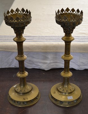 Lot 496 - A pair of Victorian style Gothic brass pricket...