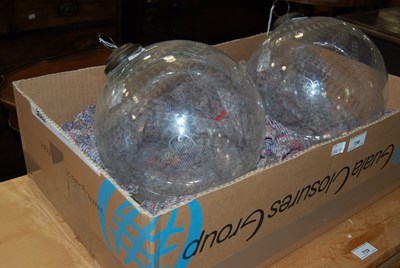 Lot 758 - A pair of vintage clear glass spheres with...
