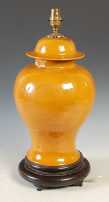 Lot 542 - A Chinese porcelain monochrome jar and cover...