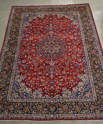 Lot 866 - A Persian Isfahan carpet, 400cm x 300cm.