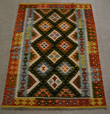 Lot 873 - A Maimana Kilim rug, the black coloured...