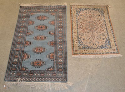 Lot 883 - A Persian silk rug of small size, the...