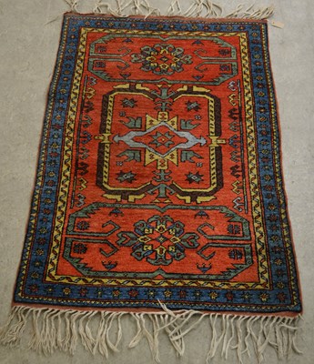 Lot 884 - A Persian rug, 20th century, the red coloured...