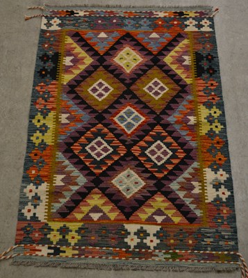 Lot 886 - A Maimana Kilim rug, the rectangular black...
