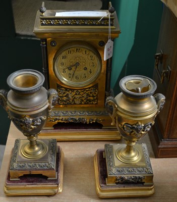Lot 300 - A 19th century gilt metal clock garniture, the...