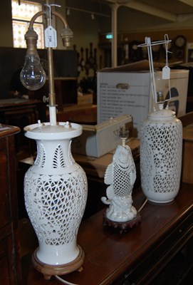 Lot 730 - A group of three Chinese reticulated porcelain...