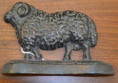 Lot 318 - A late 19th century cast iron door porter in...