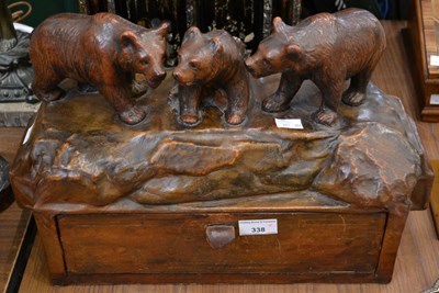 Lot 338 - A leatherbound desk tidy depicting three brown...