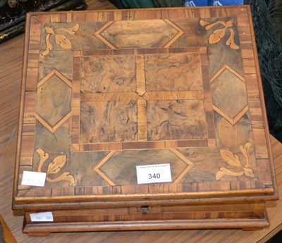 Lot 340 - A 19th century walnut writing slope/ desk tidy...