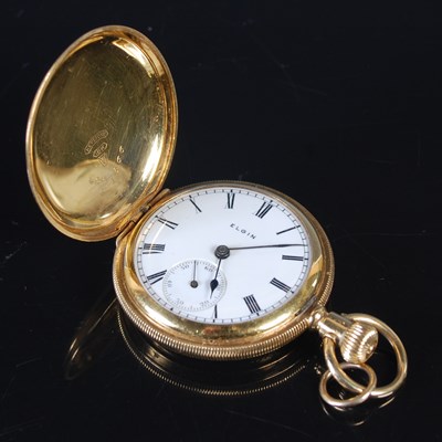 Lot 15 - A yellow metal hunter cased Elgin fob watch,...