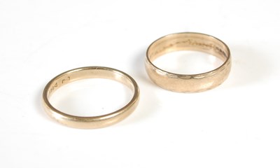 Lot 30 - Two 9ct gold rings, the wider ring size L 1/2,...