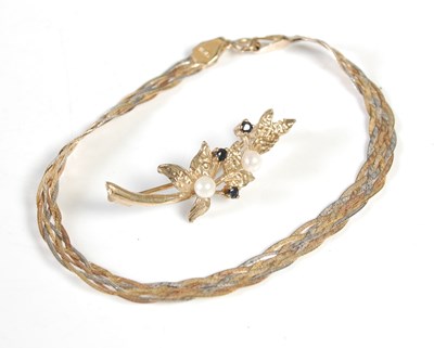 Lot 25 - A 9ct gold pearl and sapphire set brooch,...