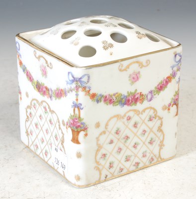 Lot 348 - A ceramic flower brick vase with dome shaped...