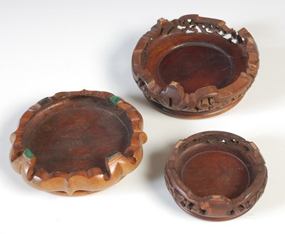 Lot 71 - Three assorted hardwood stands.