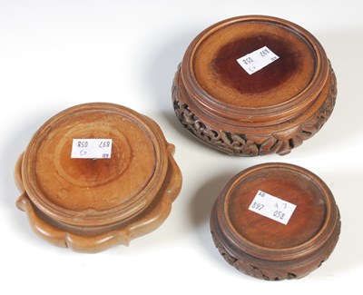 Lot 71 - Three assorted hardwood stands.