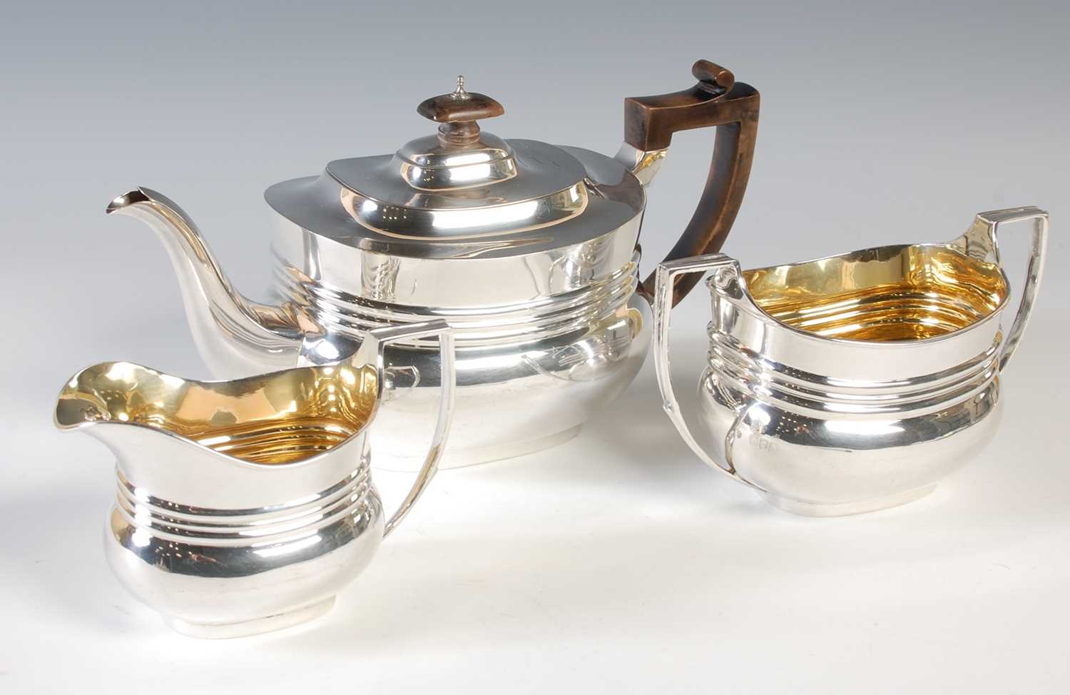 Lot 93 - An Edwardian silver three piece tea service,...