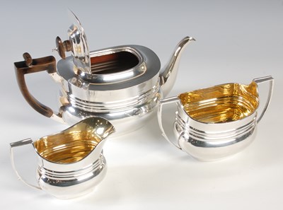 Lot 93 - An Edwardian silver three piece tea service,...