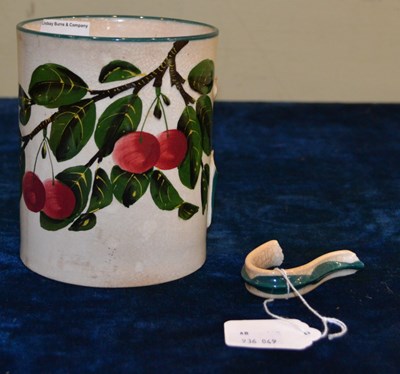 Lot 372 - A Wemyss Pottery mug decorated with cherries,...