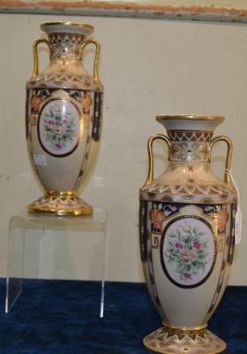 Lot 375 - A pair of Noritake ceramic urn vases, raised...