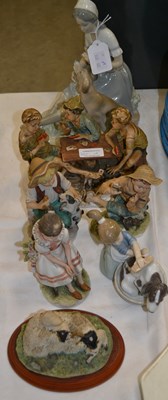 Lot 380 - An assortment of figurines to include a...