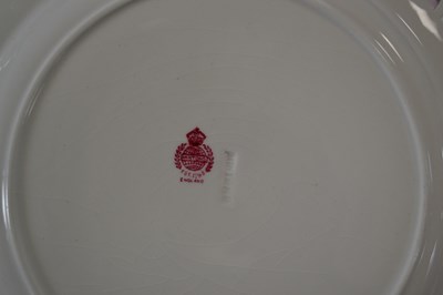 Lot 386 - A Minton part dinner service with puce printed...