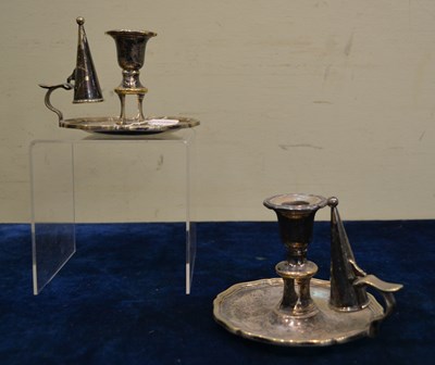 Lot 398 - A pair of silver plated chamber candlesticks...