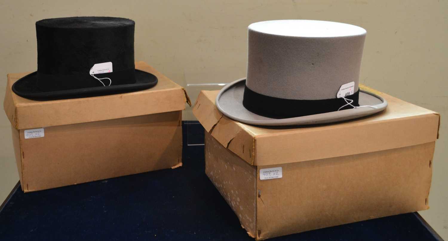 Lot 409 - Two top hats, one in grey, interior label 'R.
