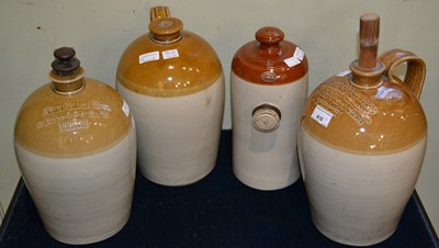 Lot 416 - A group of three stoneware flagons, two with...