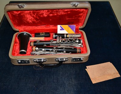 Lot 427 - A 20th century clarinet with mouthpiece...