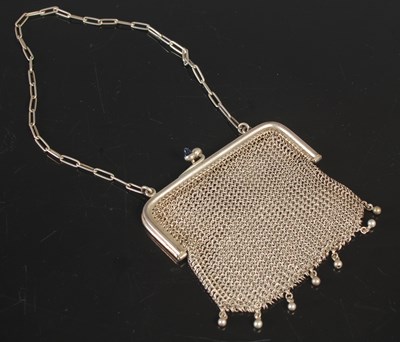 Lot 110 - An early 20th century white metal mesh purse,...