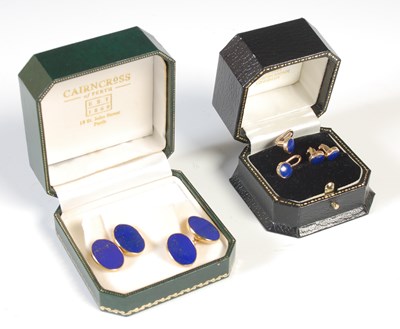Lot 143 - A pair of 18ct gold and lapis lazuli oval...