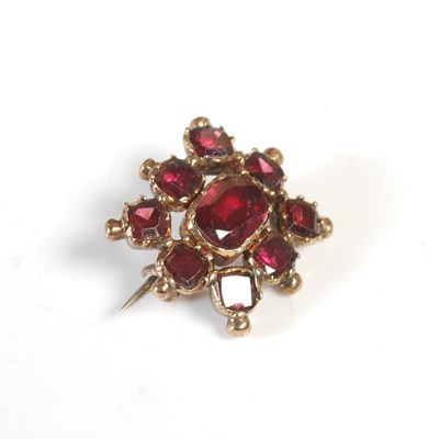 Lot 159 - A 19th century yellow metal and garnet set...