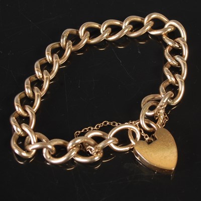 Lot 164 - A vintage rolled gold bracelet with heart...