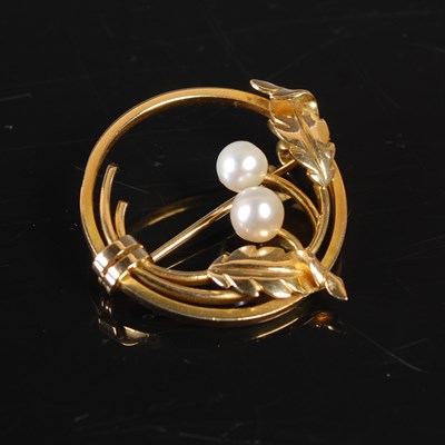 Lot 172 - A yellow metal and pearl set circular brooch,...