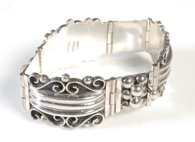 Lot 173 - A Mexican silver articulated bracelet formed...