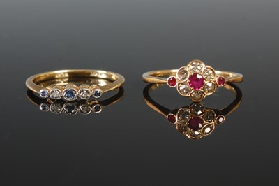 Lot 180 - A yellow metal garnet and diamond cluster ring,...