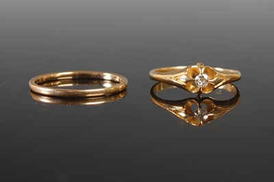 Lot 186 - An 18ct gold and single stone diamond ring,...