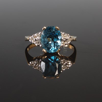 Lot 188 - A 9ct gold blue topaz and diamond set dress...