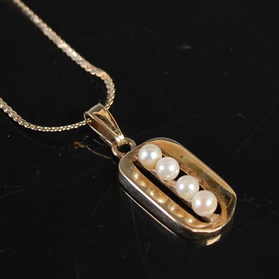 Lot 202 - A 9ct gold necklace suspending a 9ct gold and...