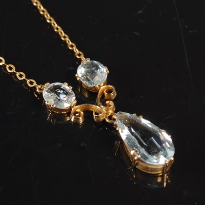 Lot 206 - A yellow metal and aquamarine pendant necklace,...