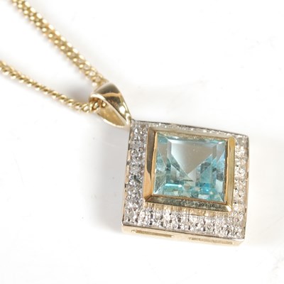 Lot 209 - A 9ct gold necklace suspending a 9ct gold...